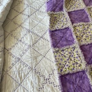 CUTE GIRLS QUILT, PURPLE AND YELLOW WITH FRINGED SEAMS.